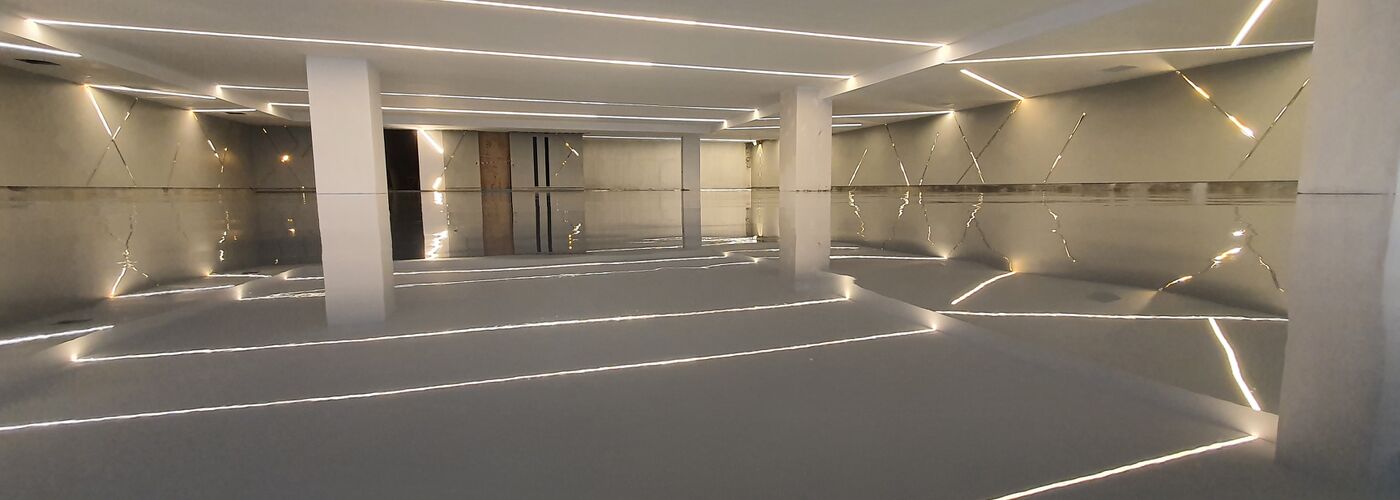 high quality shiny floor coating reflecting surrounding lights